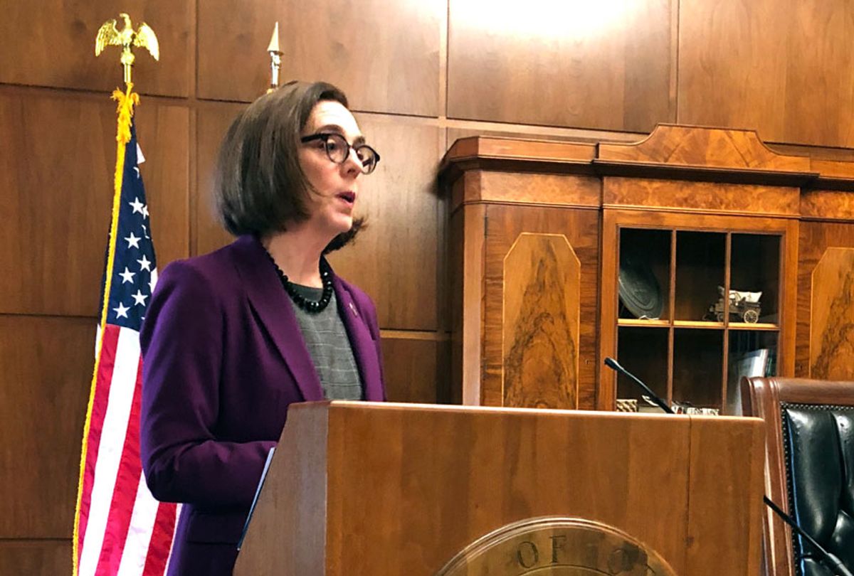 Gov. Kate Brown of Oregon denounces a walkout by Republicans in the state Senate that prevented a quorum on Monday, Feb. 24, 2020 in Salem, Ore. Republican lawmakers are trying to doom a contentious climate change bill. Brown said the Republicans are not against the climate policy but are against the Democratic process.  (AP Photo/Andrew Selsky)