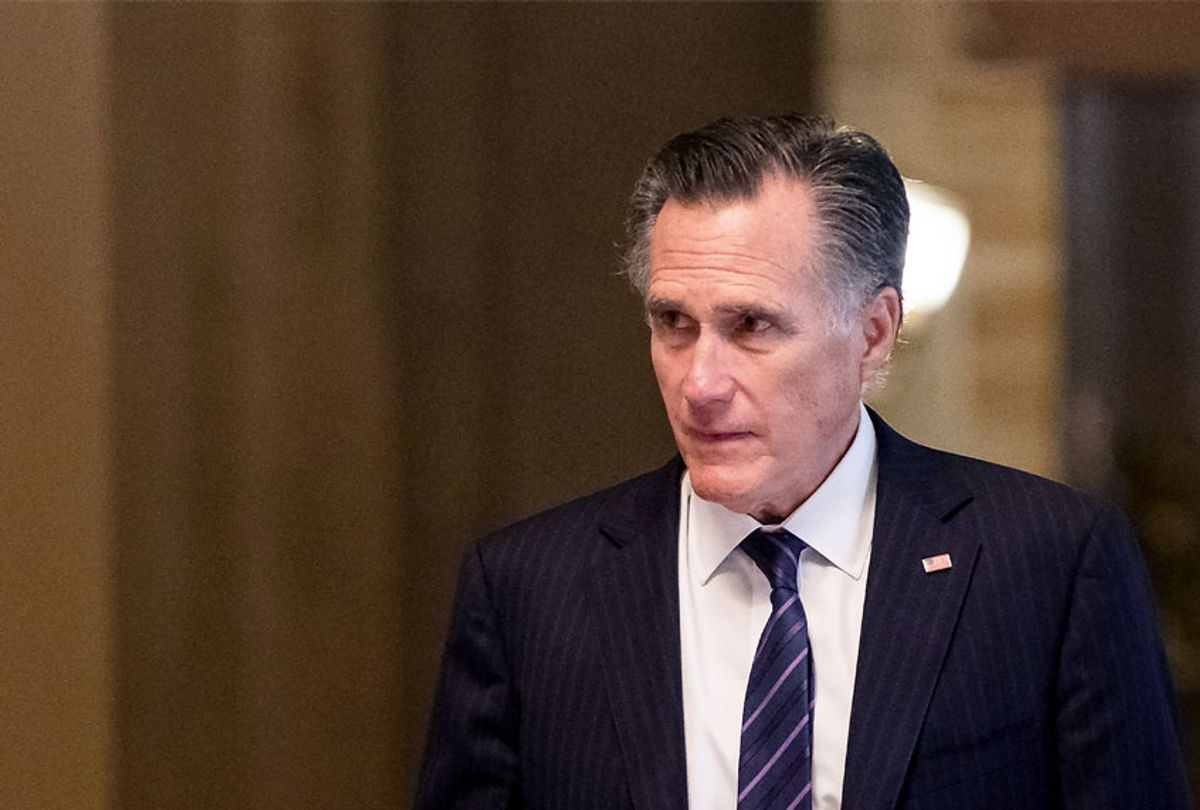 Sen. Mitt Romney (R-UT) returns to the Senate floor following a recess in the Senate impeachment trial of President Donald Trump (Samuel Corum/Getty Images)