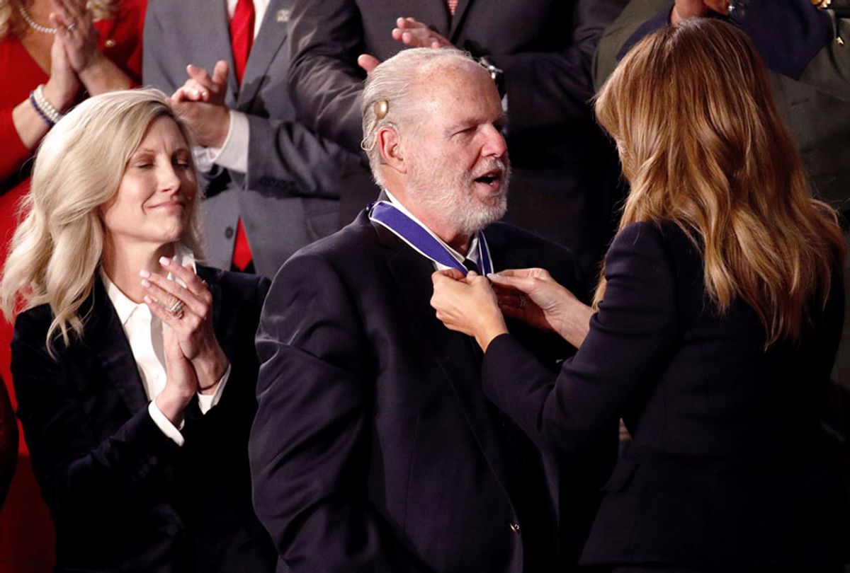 First Lady Melania Trump presents the Presidential Medal of Freedom to Rush Limbaugh as his wife Kathryn watches during the State of the Union address to a joint session of Congress on Capitol Hill in Washington, Tuesday, Feb. 4, 2020.  (AP Photo/Patrick Semansky)