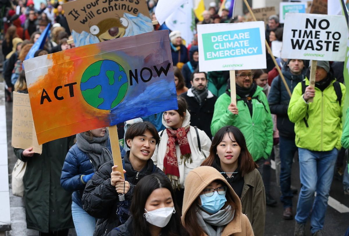 People take part in a "Youth Strike 4 Climate" protest against global warming and climate change outside the Central Station on March 6, 2020 in Brussels, Belgium. (Dursun Aydemir/Anadolu Agency via Getty Images)