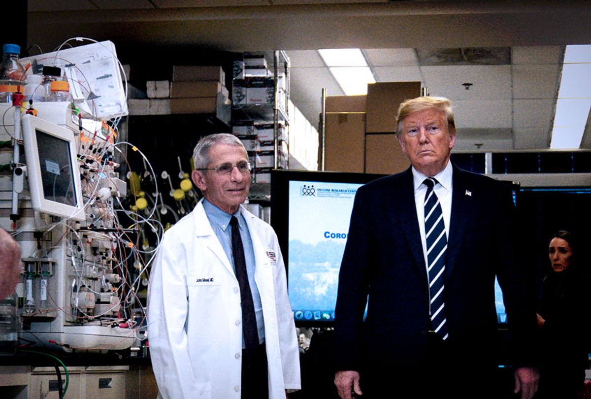 President Donald Trump tours the Viral Pathogenesis Laboratory at the National Institutes of Health, Tuesday, March 3, 2020, in Bethesda, Md., with Anthony Fauci, head of the National Institute of Allergy and Infectious Diseases at the National Institutes of Health.  (AP Photo/Evan Vucci)