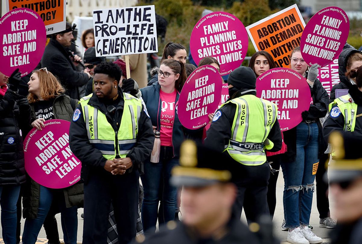 Pro-choice and pro-life activists demonstrate in front of the the US Supreme Court during the 47th annual March for Life on January 24, 2020 in Washington, DC. (OLIVIER DOULIERY/AFP via Getty Images)