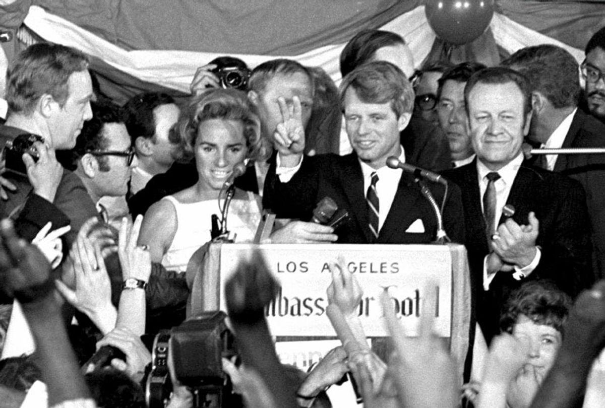 This June 5, 1968 file photo shows Sen. Robert F. Kennedy speaking his final words to supporters at the Ambassador Hotel in Los Angeles, moments before he was shot on June 5, 1968. At his side are his wife, Ethel, left, and his California campaign manager, Jesse Unruh, right. Football player Roosevelt Grier is at right rear. Associated Press Hollywood reporter Bob Thomas was on a one-night political assignment in June 1968 to cover Kennedy’s victory in the California presidential primary when mayhem unfolded before his eyes. (AP Photo/Dick Strobel, File)