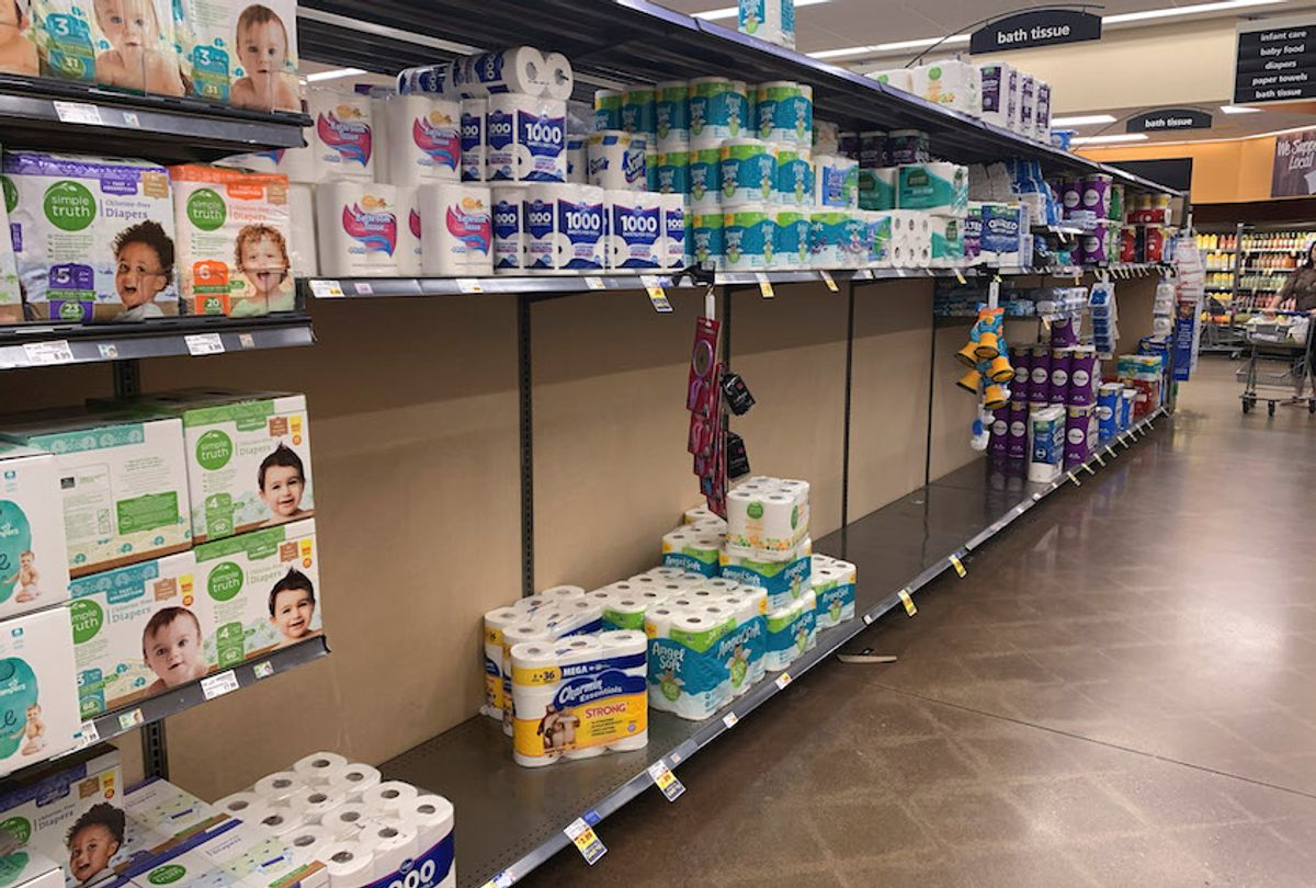 An aisle of toilet paper is nearly empty at a Kroger grocery store. (Jeremy Hogan/SOPA Images/LightRocket via Getty Images)