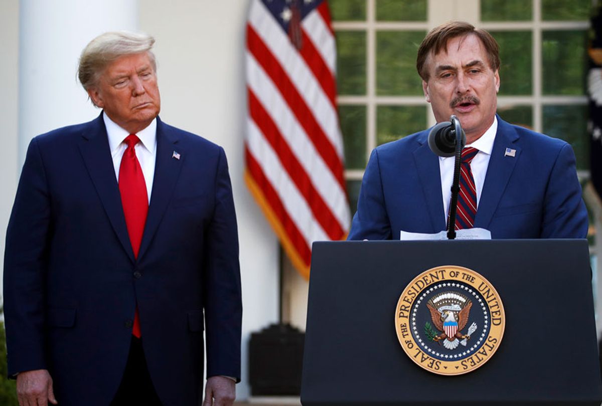 My Pillow CEO Mike Lindell speaks as President Donald Trump listens during a briefing about the coronavirus in the Rose Garden of the White House, Monday, March 30, 2020, in Washington.  (AP Photo/Alex Brandon)