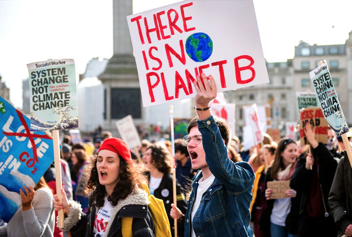 Teenage Climate Crisis activists from various climate activism groups protesting. (Ollie Millington/Getty Images)