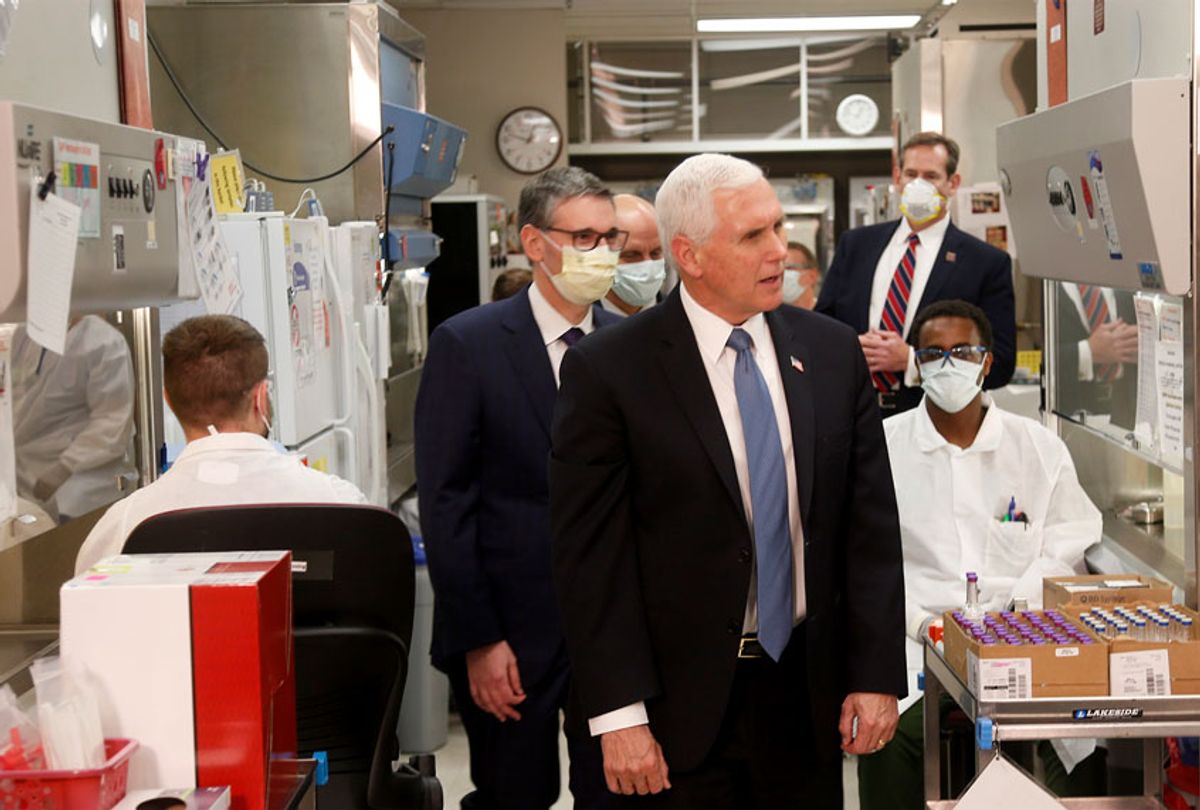 Vice President Mike Pence visits the molecular testing lab at Mayo Clinic Tuesday, April 28, 2020, in Rochester, Minn., where he toured the facilities supporting COVID-19 research and treatment. (AP Photo/Jim Mone)