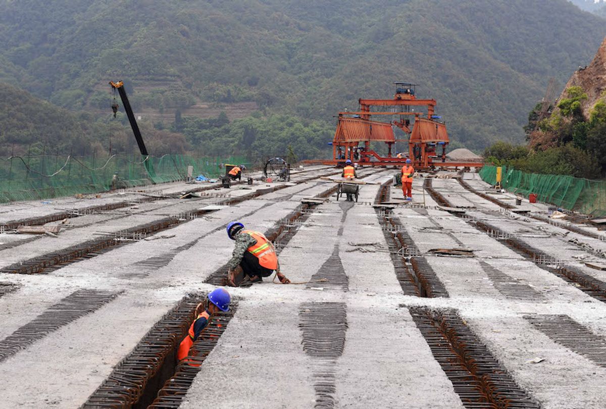 People work at the construction site of Chahe grand bridge of the Kunming-Chuxiong expressway in southwest China's Yunnan Province, April 28, 2020.  (Xinhua/Yang Zongyou via Getty Images)
