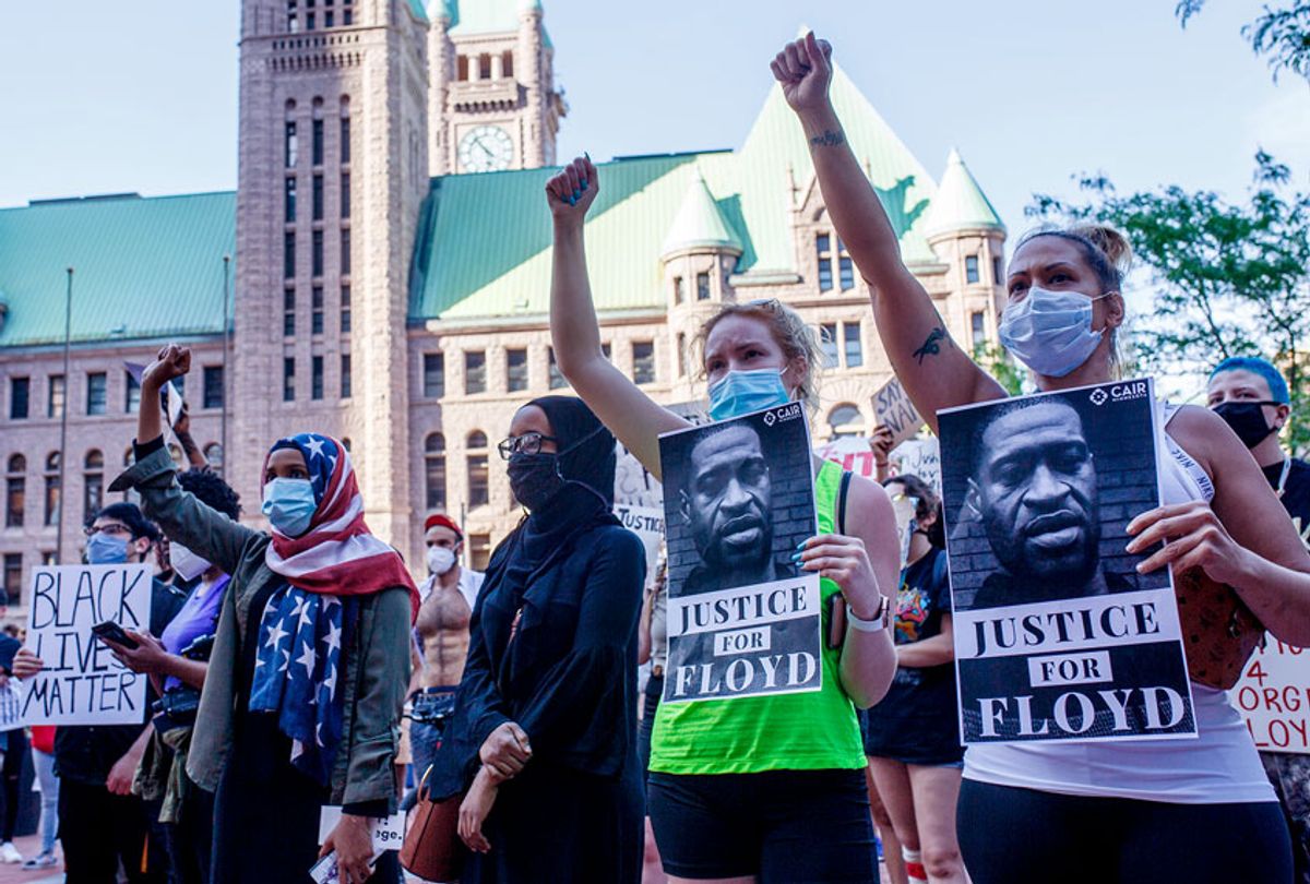Protesters gather in a call for justice for George Floyd, a black man who died after a white policeman kneeled on his neck for several minutes, at Hennepin County Government Plaza, on May 28, 2020 in Minneapolis, Minnesota. (KEREM YUCEL/AFP via Getty Images)