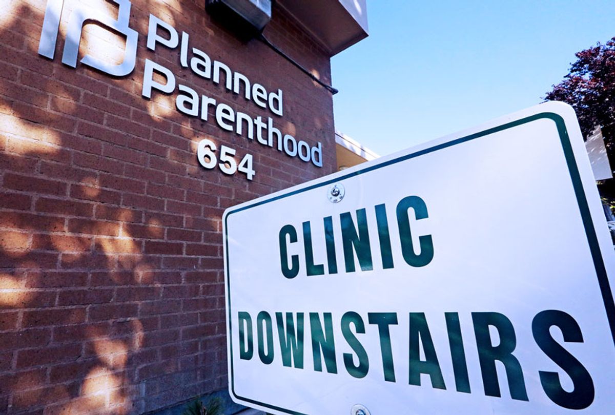 A sign is displayed at Planned Parenthood (AP Photo/Rick Bowmer)