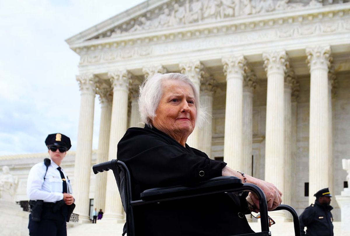 Transgender activist Aimee Stephens, sits in her wheelchair outside the US Supreme Court in Washington, DC (Getty Images)