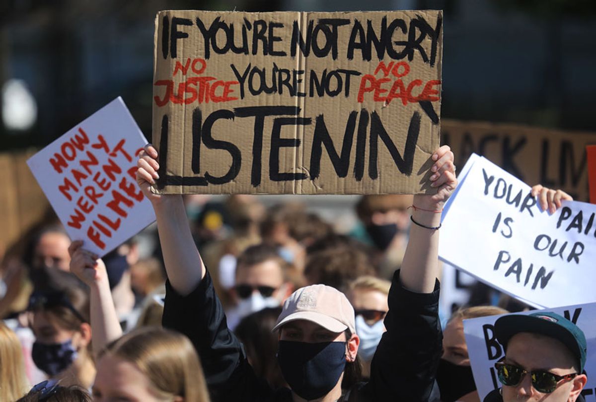 Protestors take part in a Black Lives Matter march  (PETRAS MALUKAS/AFP via Getty Images)