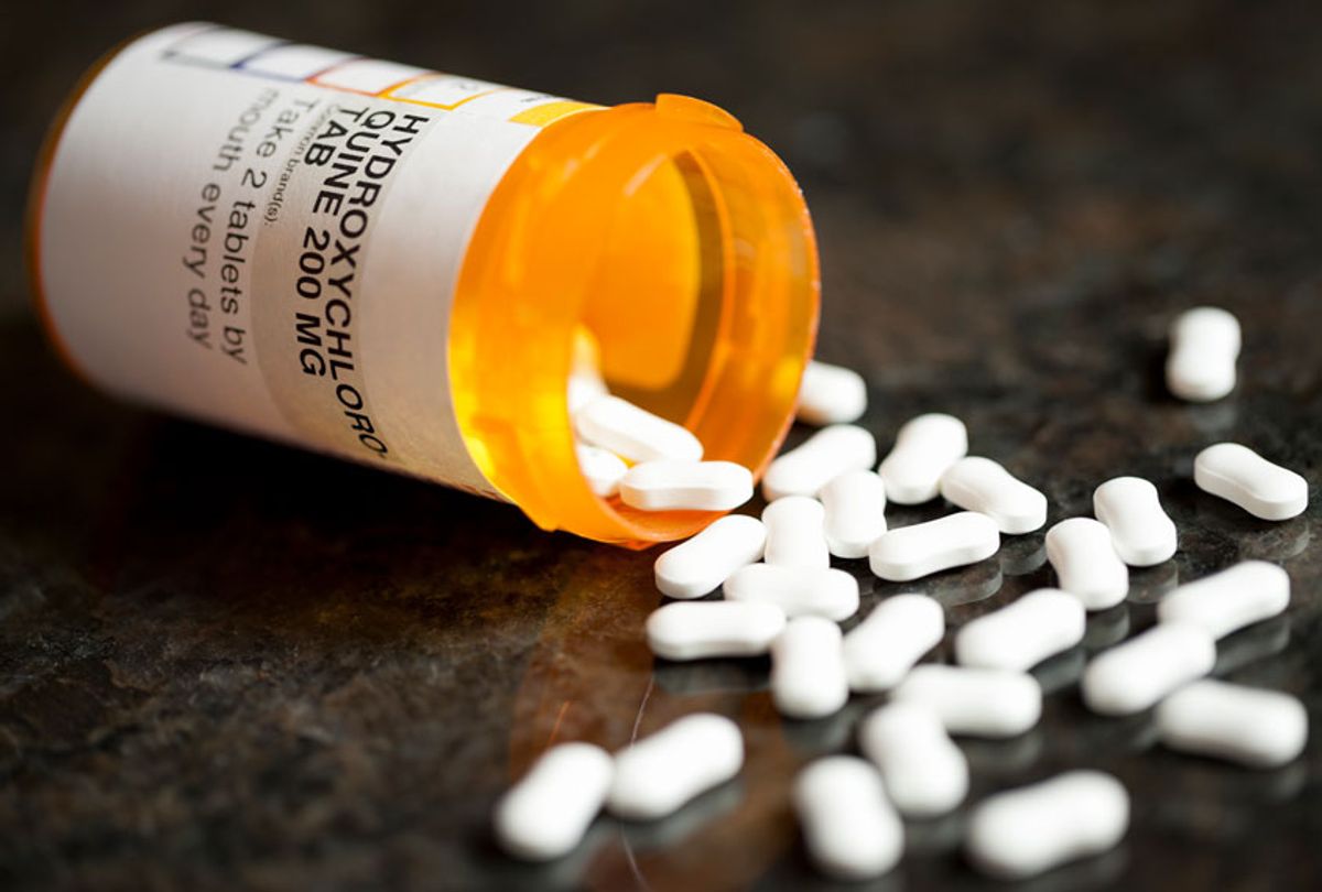 HydroxyChloroquine pills spilling out of a bottle (Getty Images)