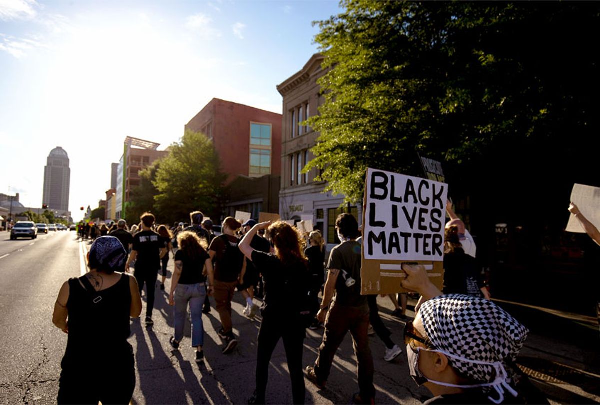 Protesters march peacefully through streets towards city hall on May 29, 2020 in Louisville, Kentucky. Protests have erupted after recent police-related incidents resulting in the deaths of African-Americans Breonna Taylor in Louisville and George Floyd in Minneapolis, Minnesota. (Brett Carlsen/Getty Images)