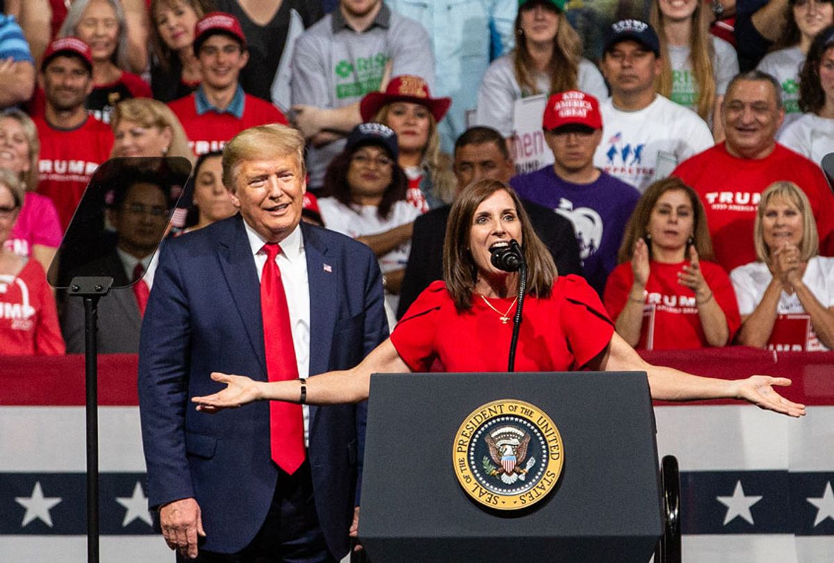  Sen. Martha McSally (R-AZ) speaks to the crowd with President Donald Trump at a rally at the Arizona Veterans Memorial Coliseum on February 19, 2020 in Phoenix, Arizona. President Trump says he will be visiting Arizona frequently in the lead up to the 2020 election. (Caitlin O'Hara/Getty Images)