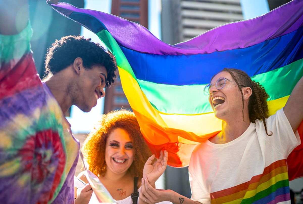 Group of friends enjoying the Pride Parade (Getty Images)