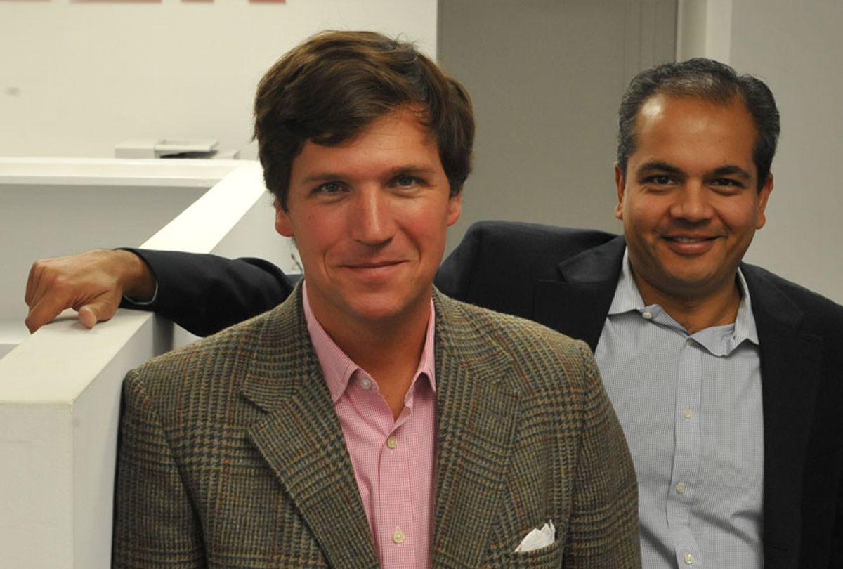 Tucker Carlson, L, and Neil Patel at the office of the new website, the Daily Caller, on January 6, 2010, in Washington, DC. The site, at which Carlson is the editor-in-cheif and Patel is the publisher, has been branded as a "conservative Huffington Post." (Jahi Chikwendiu/The Washington Post via Getty Images)