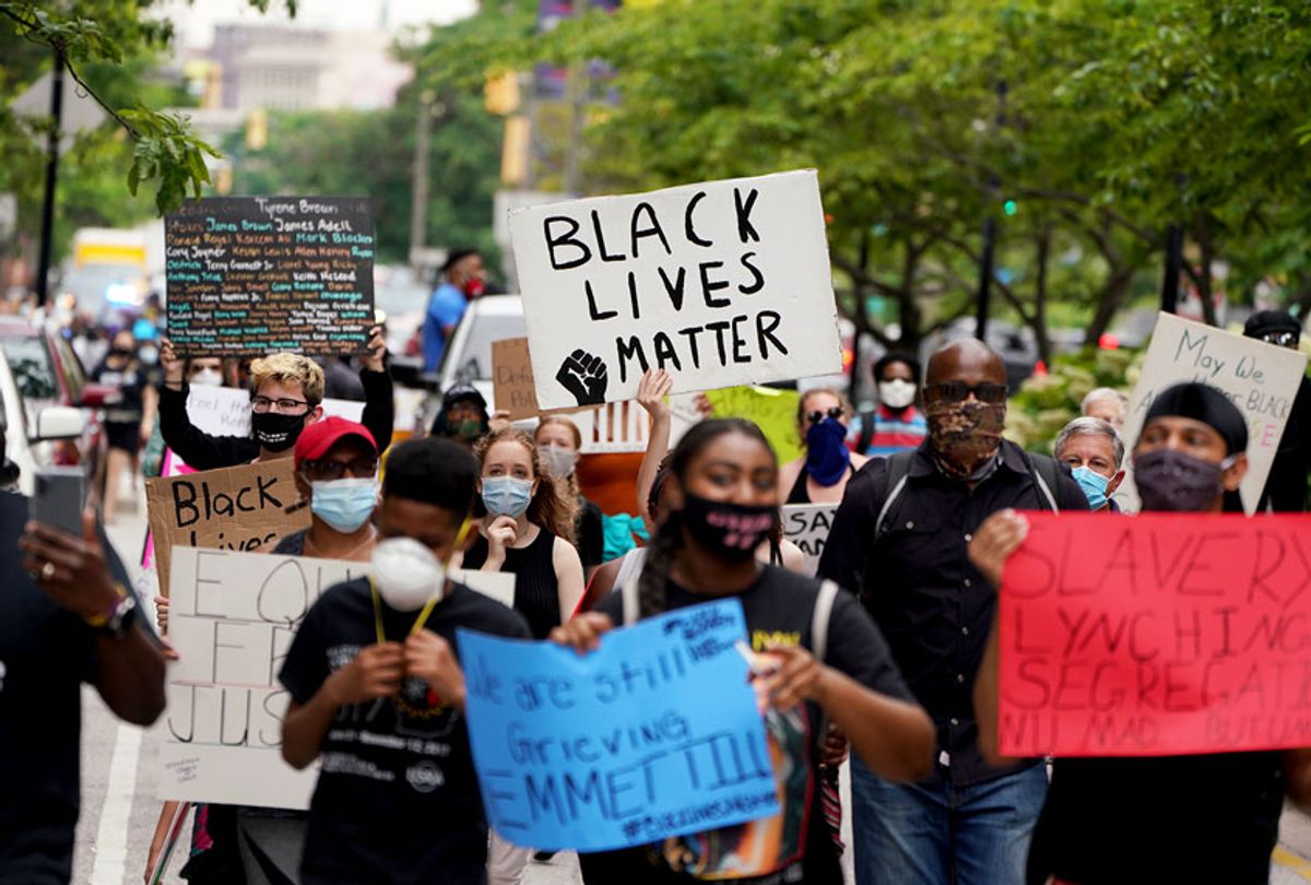 Demonstrators march as part of a Juneteenth Celebration on June 19, 2020 in Baltimore, Maryland. Juneteenth commemorates June 19, 1865, when a Union general read orders in Galveston, Texas stating all enslaved people in Texas were free according to federal law. (J. Countess/Getty Images)