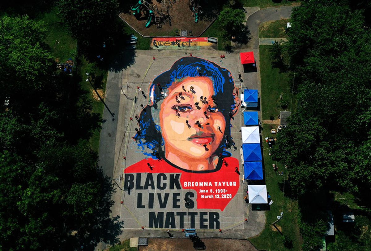  In an aerial view from a drone, a large-scale ground mural depicting Breonna Taylor with the text 'Black Lives Matter' is seen being painted at Chambers Park on July 5, 2020 in Annapolis, Maryland.  (Patrick Smith/Getty Images)