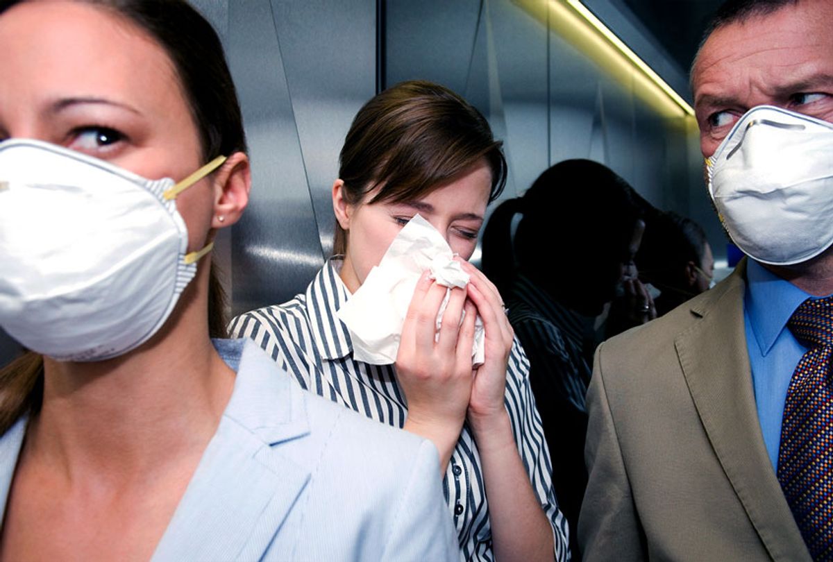 People in a lift during a health alert (Getty Images)