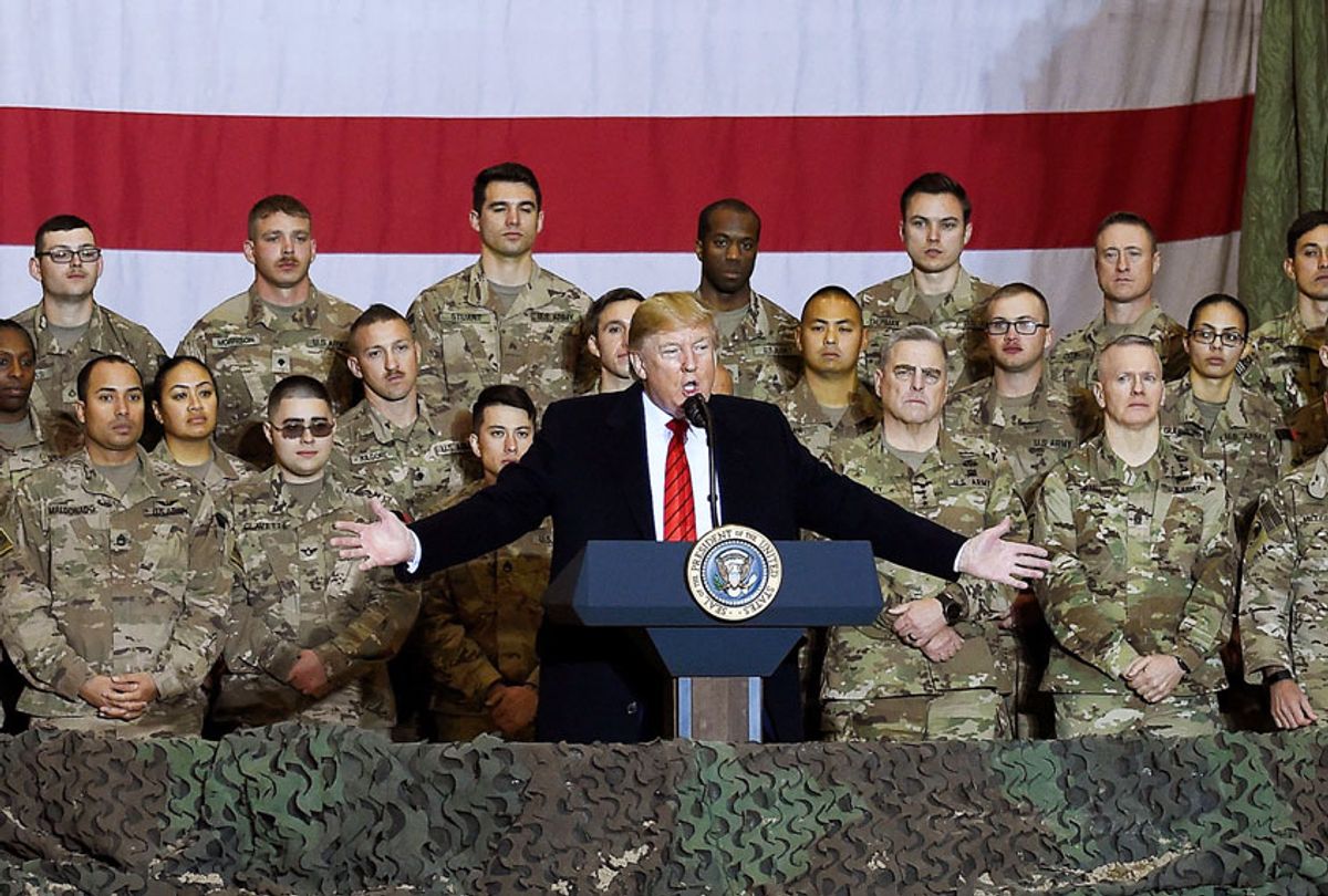 November 28, 2019, US President Donald Trump speaks to the troops during a surprise Thanksgiving day visit at Bagram Air Field in Afghanistan. (Getty Images)