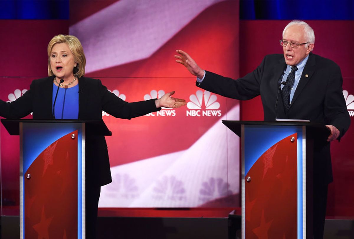 Hillary Clinton (L) and Bernie Sanders (R) participate in the NBC News -YouTube Democratic Candidates Debate on January 17, 2016 at the Gaillard Center in Charleston, South Carolina (TIMOTHY A. CLARY/AFP via Getty Images)