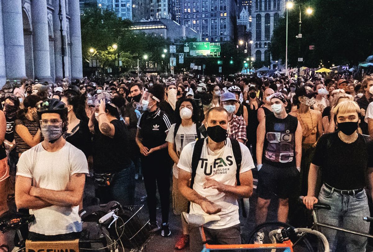 Protesters barricade the street with bikes and hundreds of people at City Hall, Manhattan. (Ira L. Black/Corbis/Getty Images)