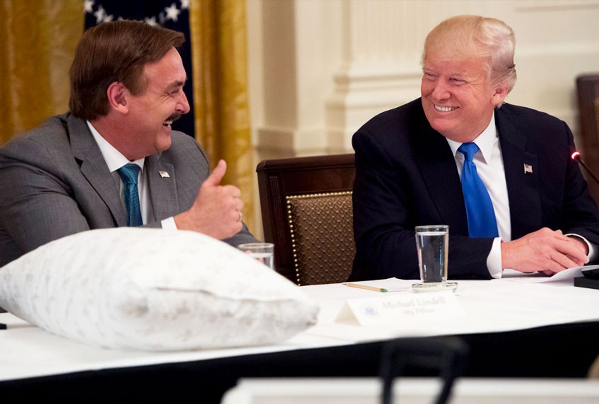 US President Donald Trump speaks alongside Mike Lindell (L), founder of My Pillow, during a Made in America event with US manufacturers in the East Room of the White House in Washington, DC (SAUL LOEB/AFP via Getty Images)
