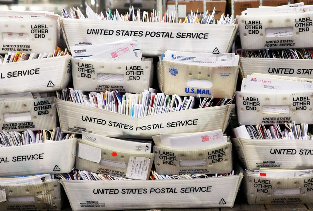Stacks of boxes mail are seen at the U.S. Post Office  (Justin Sullivan/Getty Images)