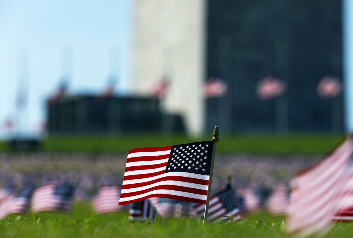 American flags placed on the National Mall by the Covid Memorial Project to represent the 200,000 Americans that have lost their lives due to the coronavirus (COVID-19) pandemic, in Washington, DC, USA on September 22, 2020. (Yasin Ozturk/Anadolu Agency via Getty Images)