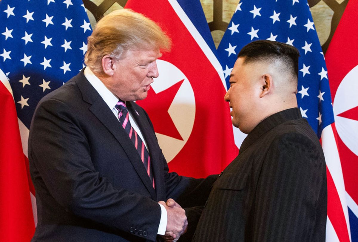 US President Donald Trump (L) shakes hands with North Korea's leader Kim Jong Un before a meeting at the Sofitel Legend Metropole hotel in Hanoi on February 27, 2019. (SAUL LOEB/AFP via Getty Images)