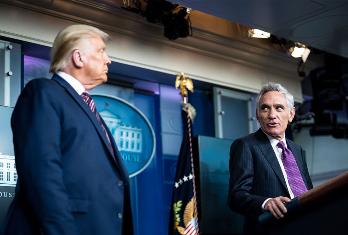 Scott Atlas, senior fellow at the Hoover Institution, speaks with President Donald J. Trump during a COVID-19 coronavirus briefing in the James S. Brady Briefing Room at the White House on Wednesday, Aug 12, 2020 in Washington, DC. (Jabin Botsford/The Washington Post via Getty Images)