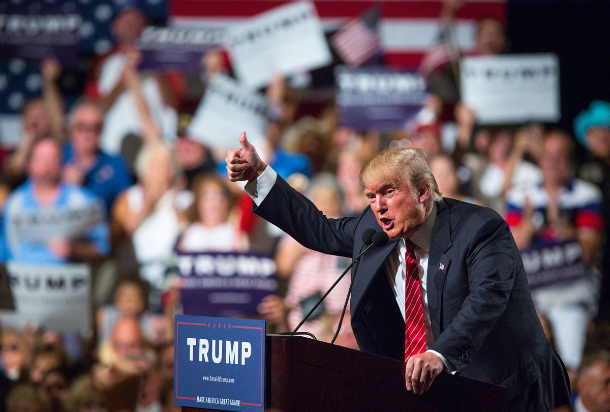 Republican Presidential candidate Donald Trump addresses supporters during a political rally at the Phoenix Convention Center on July 11, 2015 in Phoenix, Arizona. Trump spoke about illegal immigration and other topics in front of an estimated crowd of 4,200. (Charlie Leight/Getty Images)