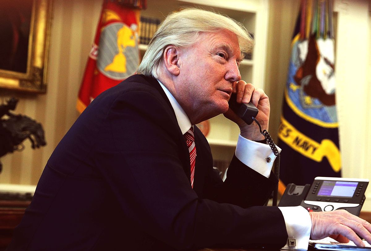 Donald Trump on the phone in the Oval Office (Getty Images/Alex Wong)