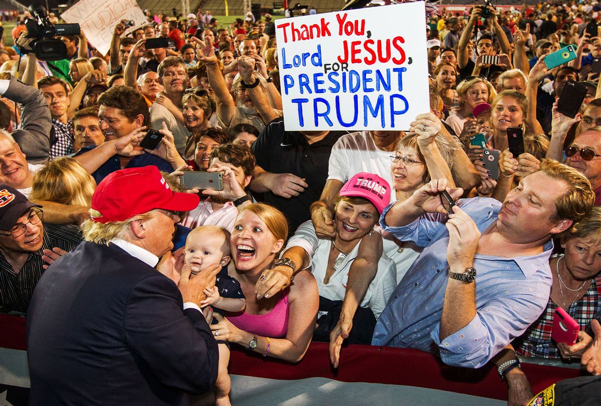 Republican presidential candidate Donald Trump greets supporters after his rally at Ladd-Peebles Stadium on August 21, 2015 in Mobile, Alabama. The Trump campaign moved tonight's rally to a larger stadium to accommodate demand. (Mark Wallheiser/Getty Images)