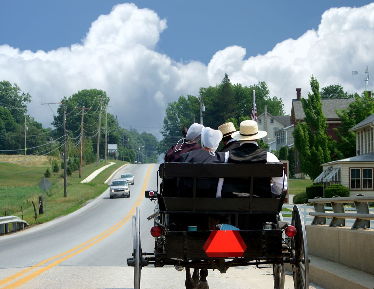 This open buggy appears to be heading right into a storm. Lancaster County, PA. (Getty Images)