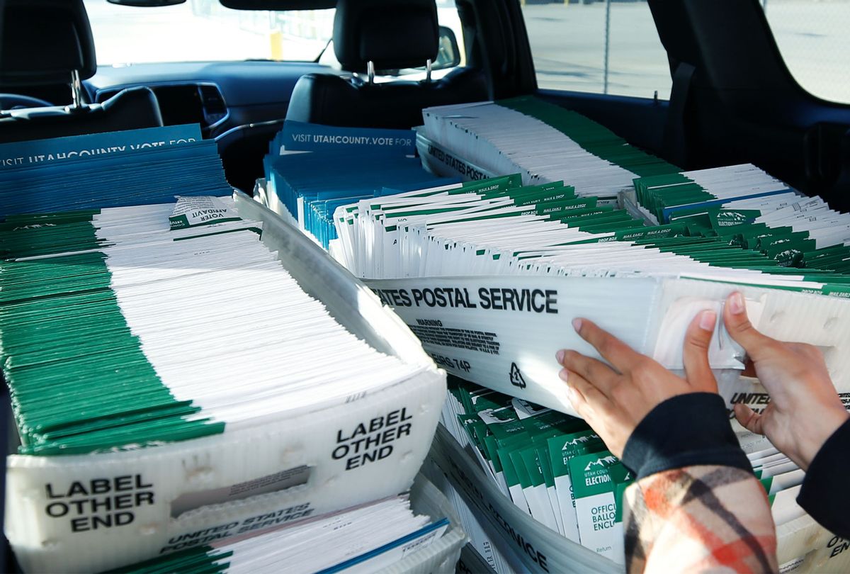 A Utah County Election worker picks up mailed ballots from the United States Postal Service office on October 26, 2020 in Provo, Utah. Utah is one of several states that has recently moved to mail-in ballots for presidential elections. (Photo by  (George Frey/Getty Images)