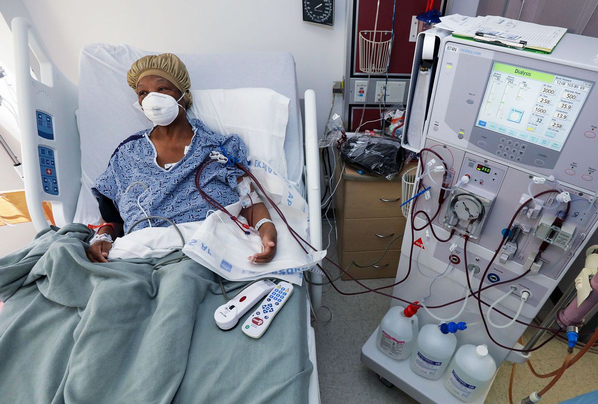 Janice Brown hooked up to a dialysis machine in COVID-19 unit isolation room at Desert Valley Medical Group, Victorville. (Irfan Khan / Los Angeles Times via Getty Images)