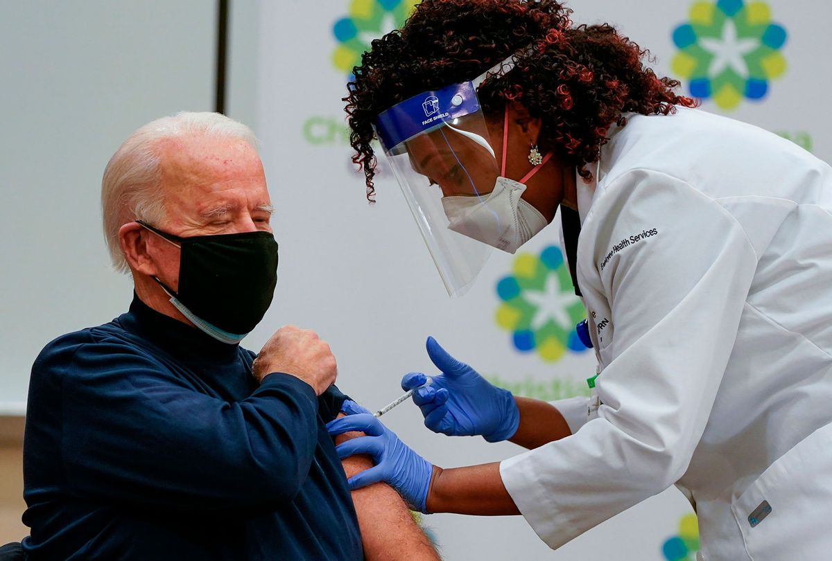 US President-elect Joe Biden receives a Covid-19 vaccination from Tabe Mase, Nurse Practitioner and Head of Employee Health Services, at the Christiana Care campus in Newark, Delaware on December 21, 2020. (Alex Edelman / AFP / Getty Images)