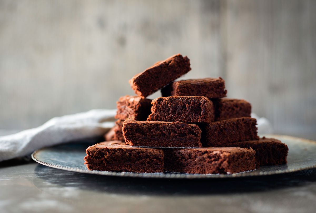 Chocolate brownies on plate (Getty Images)