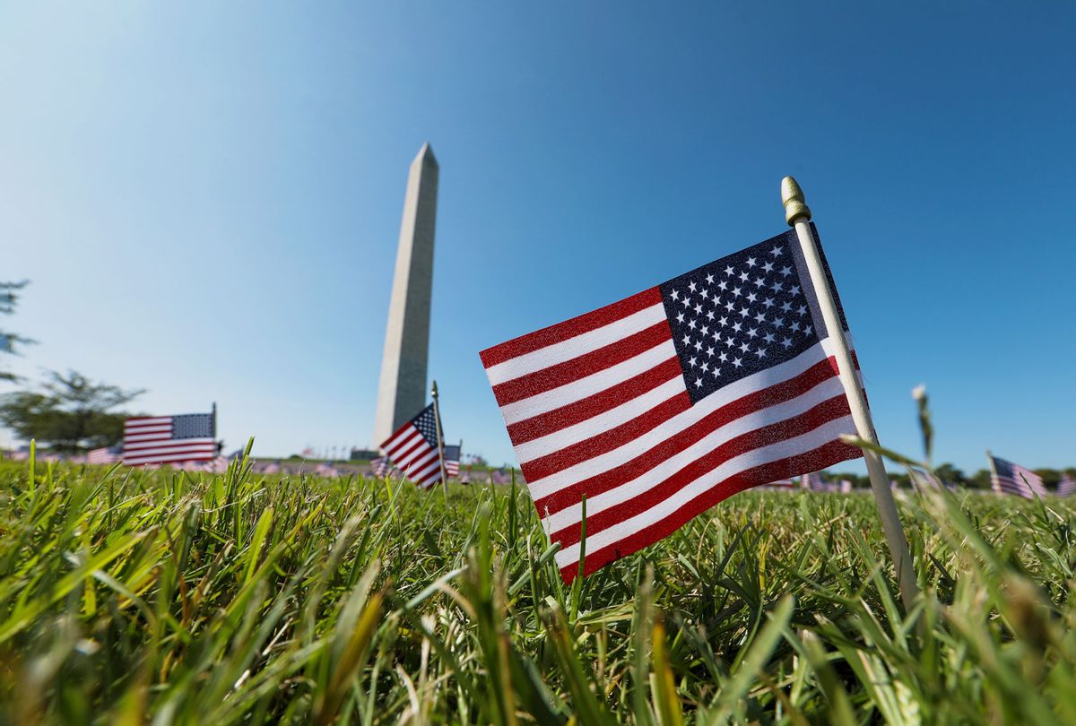 American flags placed on the National Mall by the Covid Memorial Project to represent the 200,000 Americans that have lost their lives due to the coronavirus (COVID-19) pandemic, in Washington, DC, USA on September 22, 2020. (Yasin Ozturk/Anadolu Agency via Getty Images)