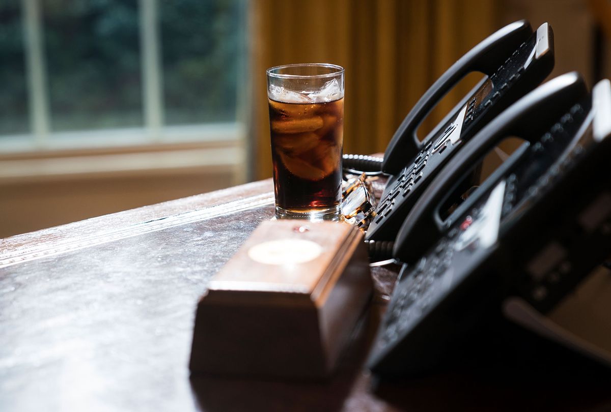 A glass of Diet coke on the Resolute Desk as President Donald Trump speaks during a meeting in the Oval Office of the White House on Wednesday, Feb. 14, 2018 (Getty Images)