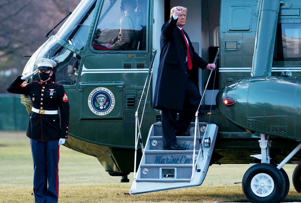President Donald Trump and first lady Melania Trump board Marine One as they depart the White House on January 20, 2021 in Washington, DC. President Trump is making his scheduled departure from the White House for Florida, several hours ahead of the inauguration ceremony for his successor Joe Biden, making him the first president in more than 150 years to refuse to attend the inauguration. (Eric Thayer/Getty Images)