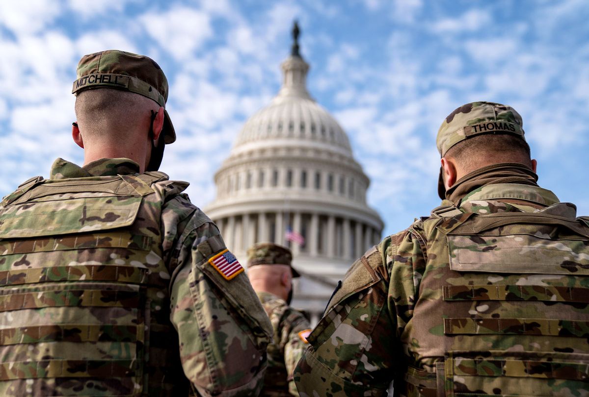 Members of the National Guard in the plaza in front of the U.S. Capitol Building on Sunday, Jan. 17, 2021 in Washington, DC. After last week's riots and security breach at the U.S. Capitol Building, the FBI has warned of additional threats in the nation's capital and across all 50 states. (Kent Nishimura / Los Angeles Times via Getty Images)