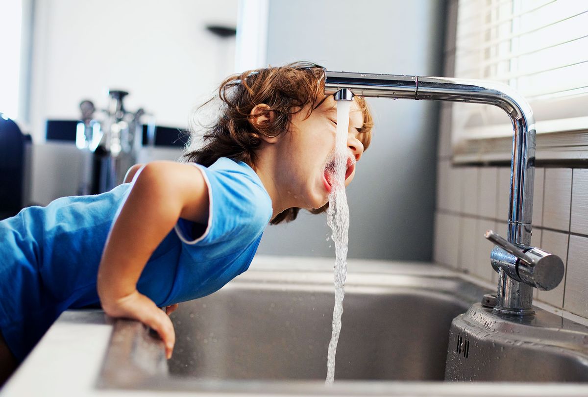 Small boy drinking water (Getty Images)