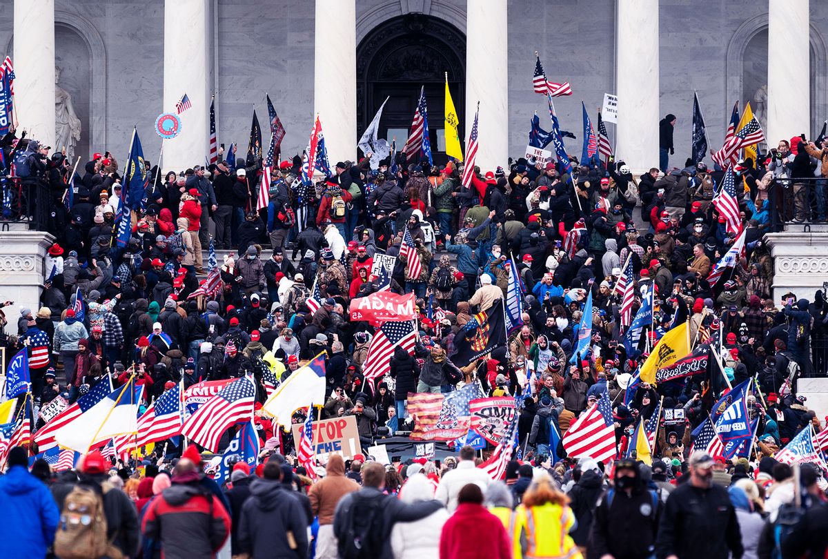 Trump supporters take over the steps of the Capitol on Wednesday, Jan. 6, 2021, as the Congress works to certify the electoral college votes. (Bill Clark/CQ-Roll Call, Inc via Getty Images)