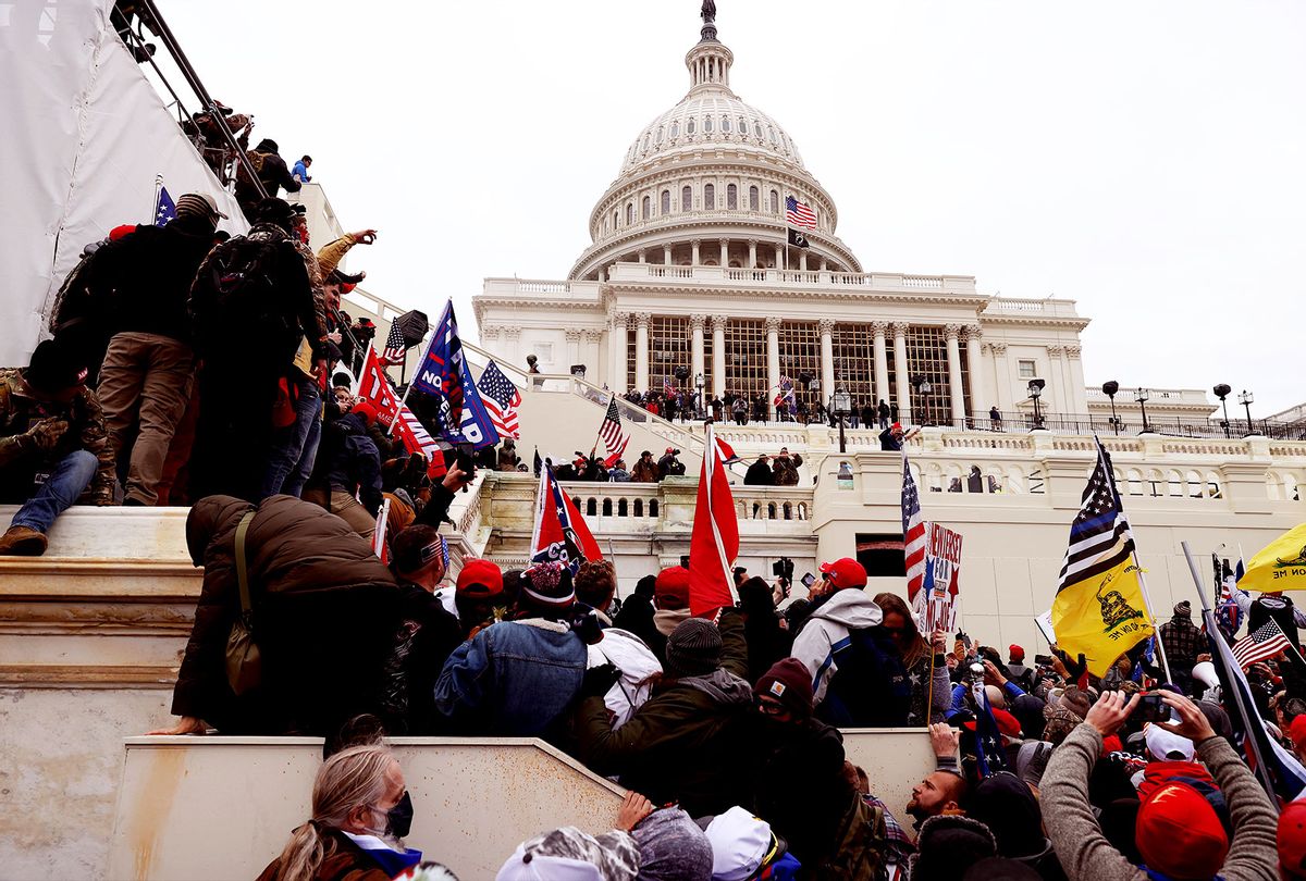 Protesters gather outside the U.S. Capitol Building on January 06, 2021 in Washington, DC. Pro-Trump protesters entered the U.S. Capitol building after mass demonstrations in the nation's capital during a joint session Congress to ratify President-elect Joe Biden's 306-232 Electoral College win over President Donald Trump. (Tasos Katopodis/Getty Images)