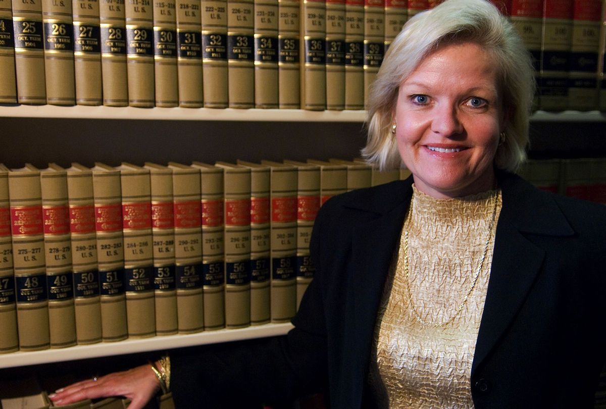 Cleta Mitchell, Esq., of Foley & Lardner, LLP, poses in the firm's law library on Tuesday, Sept. 11, 2007. (Bill Clark/Roll Call/Getty Images)