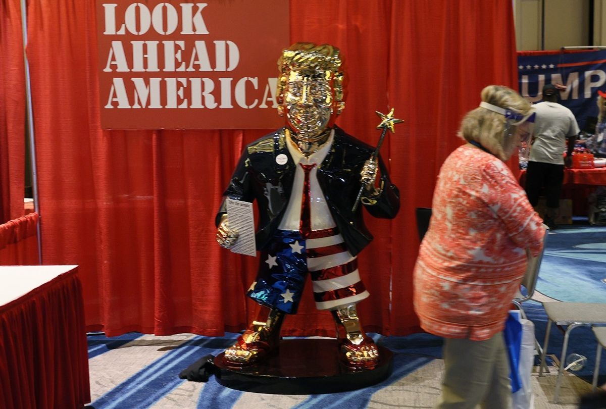 A gold statue of former President Donald Trump on display at CPAC 2021 (Joe Raedle/Getty Images)