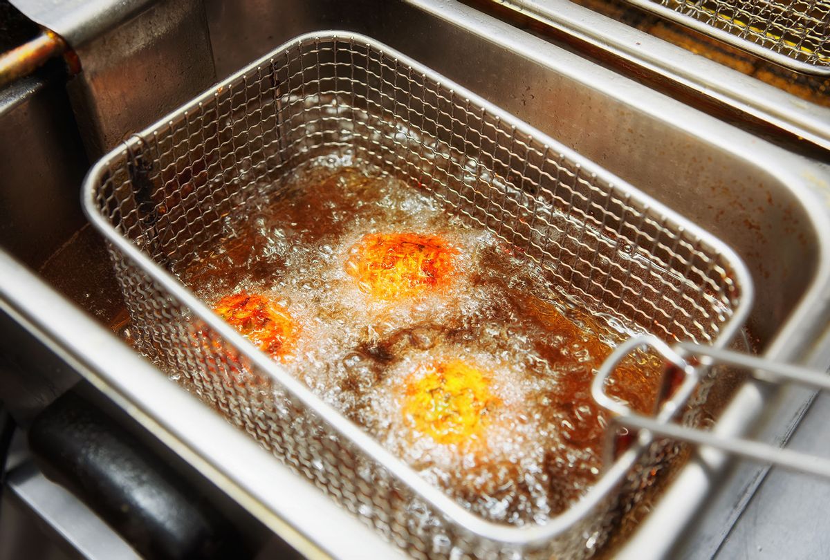 Deep frying food in restaurant kitchen (Getty Images)